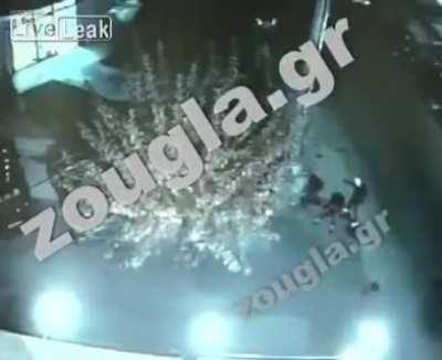 2 Golden Dawn members gunned down outside of their offices in Athens in 2013, the second guy shot just stands there and doesn't attempt to run