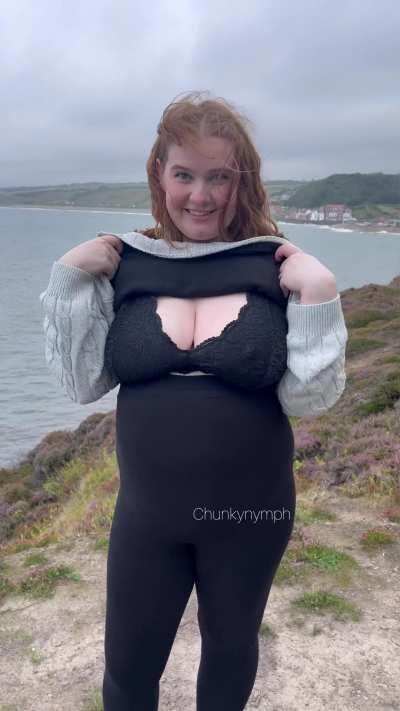 Just a pregnant lady flashing by the sea 