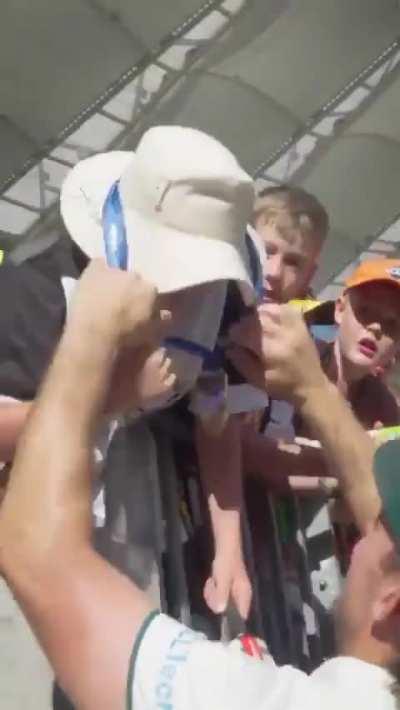 Mitch marsh (the same guy who put his leg on the prestigious WC trophy) stole a kid's medal while the kid kept crying