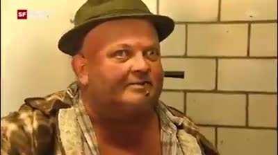 Can you please translate what this guy is saying, in hochdeutsch? Our entire office has been wondering for days now and we don't even know how to google for this