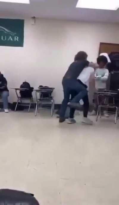 guy gets saved by teacher after starting fight
