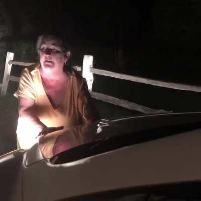 Woman calls cops on a motorist and acts out an attempted murder