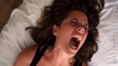 Sexy babe's orgasm face