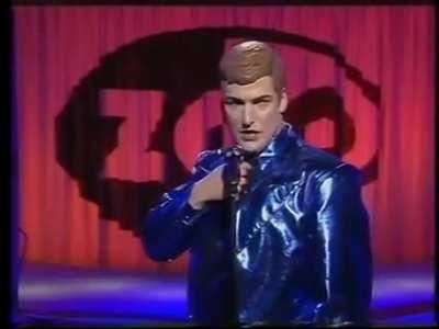 Standup Comedian performs as a robot, his movements are uncanny