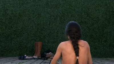 Tomb Raider Lara Croft strips down because it's too hot