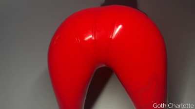 Shiny red latex catsuit with no zippers... I call it my blowjob suit :)