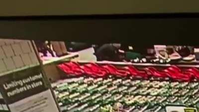 Guy in a wheelchair goes wild in a shopping centre