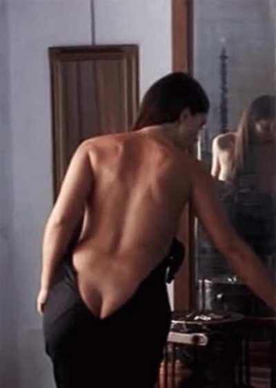 Monica getting dressed.