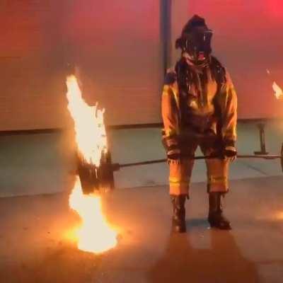 50 year old firefighter deadlifts 600 lbs of flaming steel to celebrate his retirement