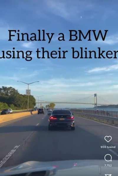 BMW driver using their turn signal.
