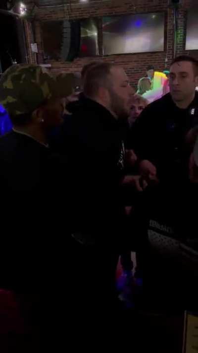 Shooter and Shootee 5 minutes before shooting outside of the Goat in Manchester NH