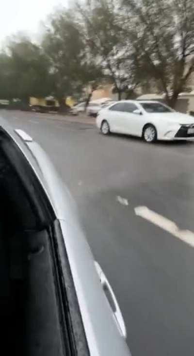 Rainy day in Kuwait with a reckless driver