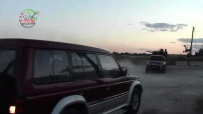 Toyota-mounted ZPU-2 being used by the FSA to engage Syrian Army positions - 2013