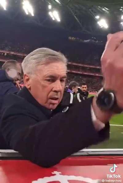Ancelotti gives chewing gum to fan!