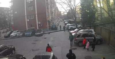 WCGW lighting fireworks on a sewer lid