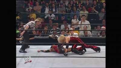 Trish sends Jacqueline and her boobs flying to the ground with a hard kick to her face