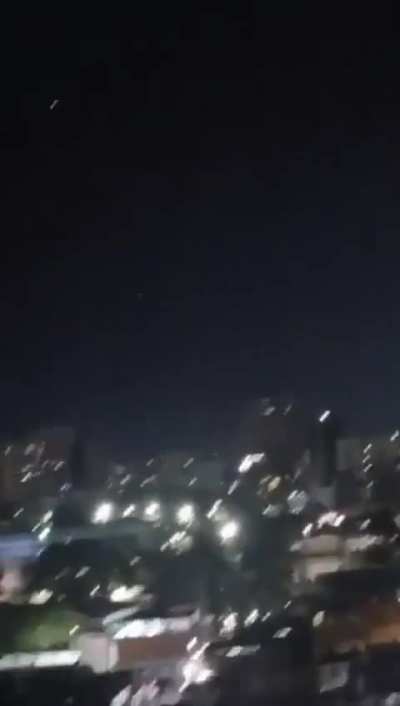 Gunfire and tracers flying in the air in Caracas, Venezuela - Jan 5th, 2026 -