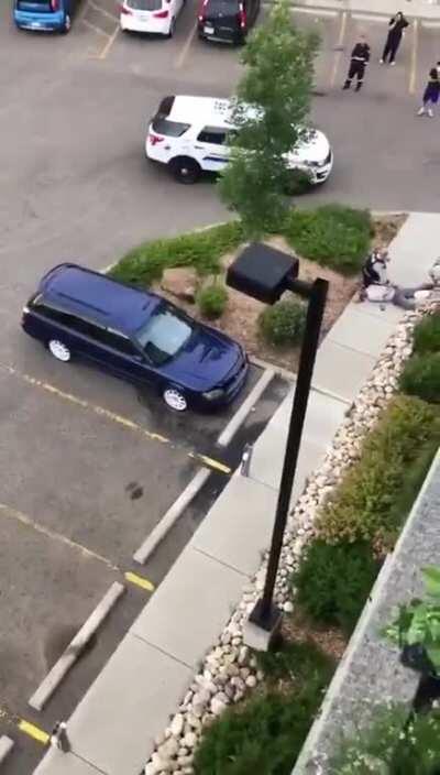 Officer in Alberta, Canada uses excessive force on an old man who isn't resisting. Smacks his head on the ground, then kneels on his head/neck.