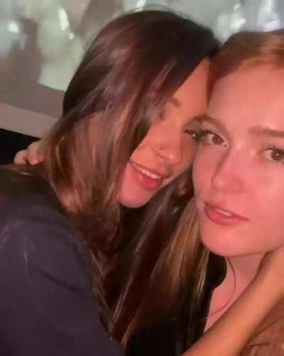 Sharing a toy and a kiss?