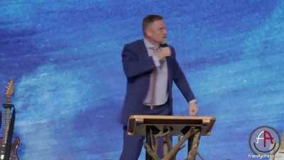 Deranged MAGA televangelist screams 