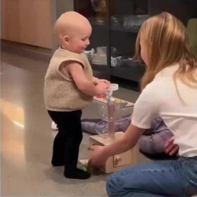 These big sisters were overjoyed to see their baby brother first steps