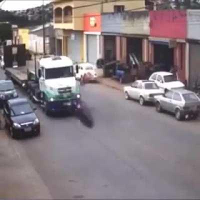 Motorcyclist sent flying during collision with a pickup truck