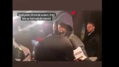 Footage of Andrew Tate getting arrested & escorted by the Romanian police for charges of Human Trafficking