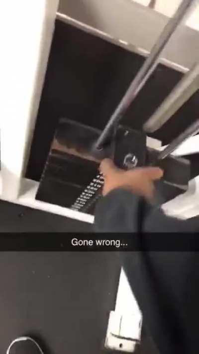 Teasing weight lifting friend with phone