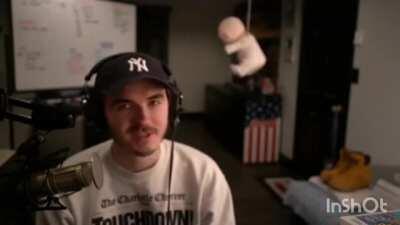 man plays with toy baby