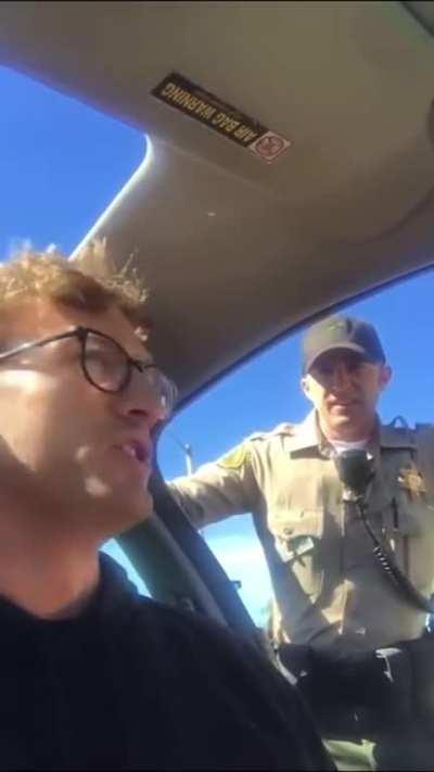 Cop on a power trip. Stops him for speeding and threatens to pepper spray him if he doesn&rsquo;t exit his car for &lsquo;safety&rsquo; reasons.