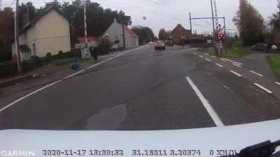 Belgian bus driver saves a woman from being run over by a train