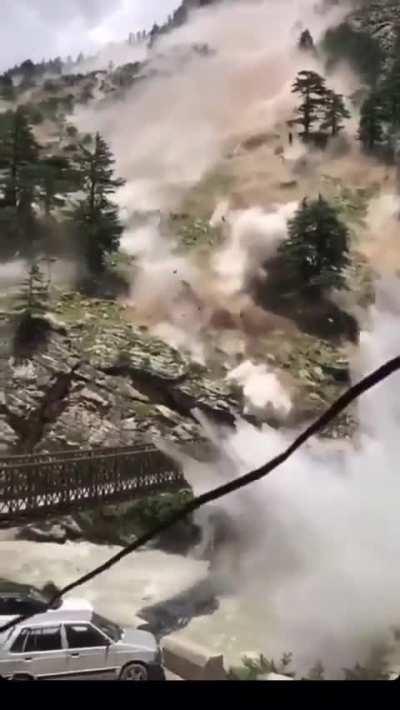 Landslide causing huge boulders to fall off from the mountain