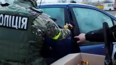 In honor of National Police Day - Ukrainian police officers sang the National Anthem at Romaniv bridge that Russians bombed.