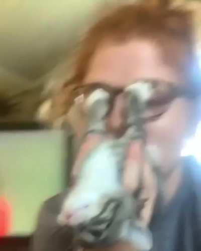 Wearing a kitty mask