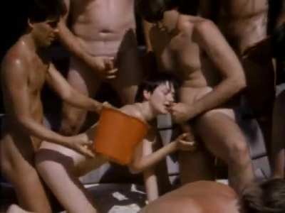 Four Girls Filling Buckets with Cum in Huge Gangbang