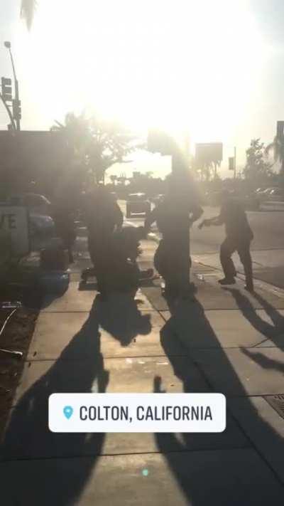 Man tries to attack protesters with axe in Colton