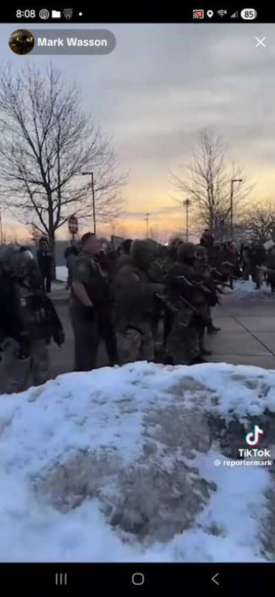 A federal agent pulled his sidearm on a protestor this morning at ICE HQ in Minnesota.