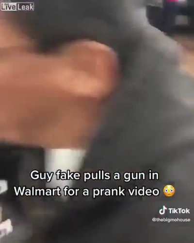 Man uses a toy gun as a prank.