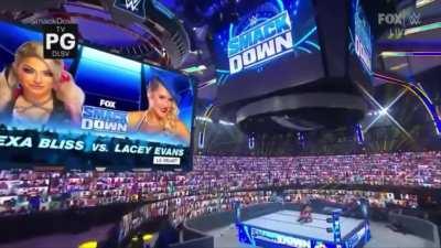 A sexy and confident Alexa talks smack about Lacey Evans backstage only to be lady handled by her for 5 minutes long!