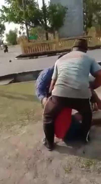 Attempting to Cut a Coconut Tree With No Concern For Safety At All