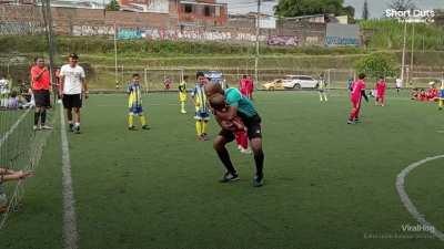 Toddler invades big brother's football game 