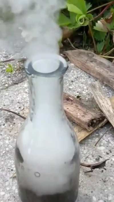 Highly concentrated hydrogen peroxide (≈50%) reacts with potassium permanganate 