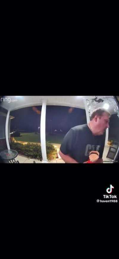 Snake bites guy on head