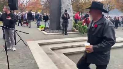 AntiVaxxers disrupts a Remembrance Day Service at a War Memorial.