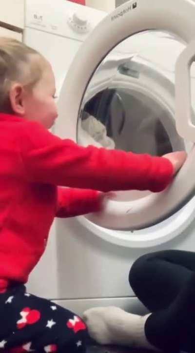 Playing peekaboo with a toddler