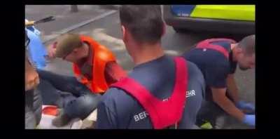 Guys who glued their hands to the ground…