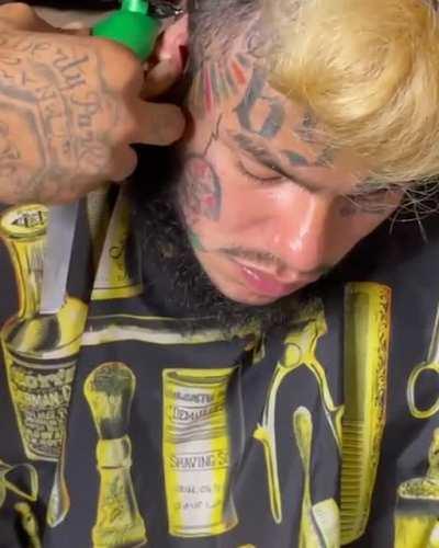 6ix9ine getting a haircut