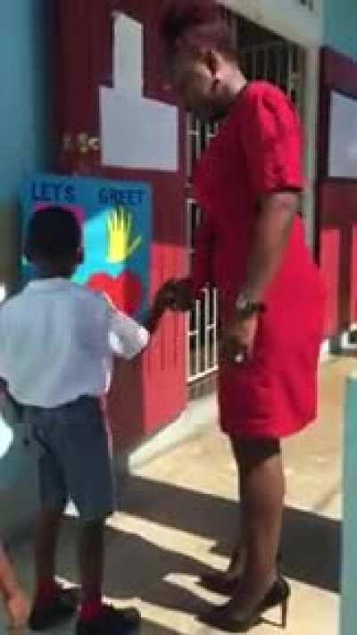 This teacher’s way of greeting her students