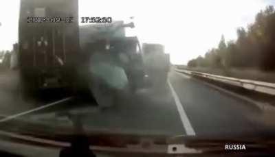 Truck driver ejected and is able to walk away