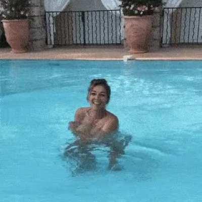 Playing in front of her son again lol